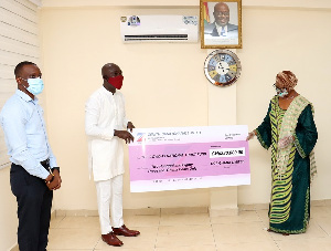 Samuel Oduro, Country Manager, OCP Africa Ghana (left), Presenting The Cheque To Sophia Akuffo, Form