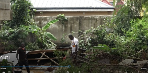 The vicitms died when an adjoining wall collapsed on the kiosk the family was sleeping in