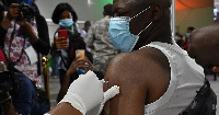 Man receiving vaccine dose