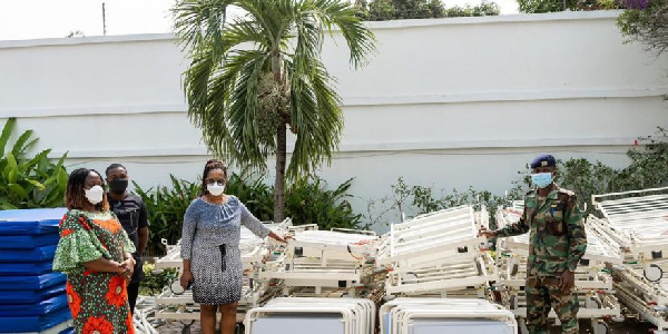 A photo of the Rebecca Foundation team presenting the beds