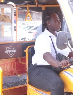 Edna Acheampong sells fruits on a tricycle