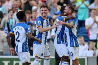 Tariq Lamptey joins his teammates to celebrate a goal