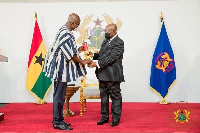 President Nana Akufo-Addo (R) and Local Government Minister Dan Botwe (L)