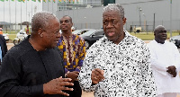 Amissah-Arthur (R) with his former boss John Mahama