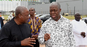 Amissah-Arthur (R) with his former boss John Mahama