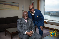 Peter Okwoche poses with President Akufo-Addo after their interview