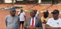 Minister for Youth and Sport, Sunday Dare (M), Augustine Eguavoen (R) at the Baba Yara Stadium