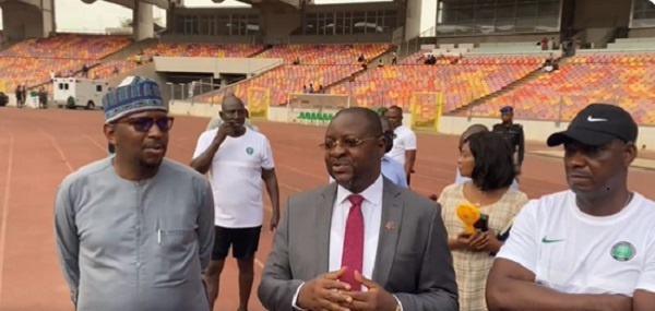 Minister for Youth and Sport, Sunday Dare (M), Augustine Eguavoen (R) at the Baba Yara Stadium