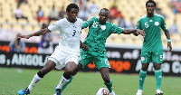 Gyan in action against Nigeria