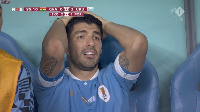 Grieving Luis Suarez