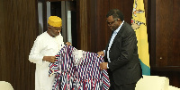 Ghana's High Commissioner to Namibia, Harruna Attah presents a smock to Namibian President