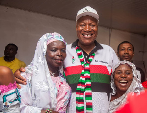 Prof. Joshua Alabi [C] with some supporters