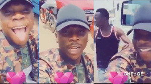 Dancehall musician Stonebwoy sitting on Okada at Ashaiman