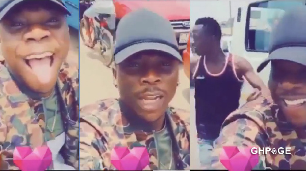 Dancehall musician Stonebwoy sitting on Okada at Ashaiman