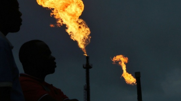 Gas flares burn from pipes at an oil flow station in Idu, Rivers State [Credit Bloomberg]