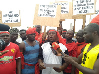 The youth carrying placards during the press conference