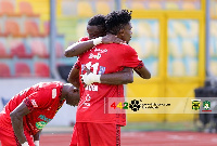 Asante Kotoko striker, Franck Etouga hugs compatriots George Mfegue