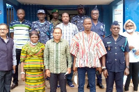 The chief, elders and police officials in a group photo with Mr Sugandh Rajaram