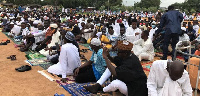 A group of Muslims praying