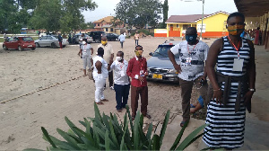 Voters queuing at the St Dominic Catholic Church polling center at Taifa