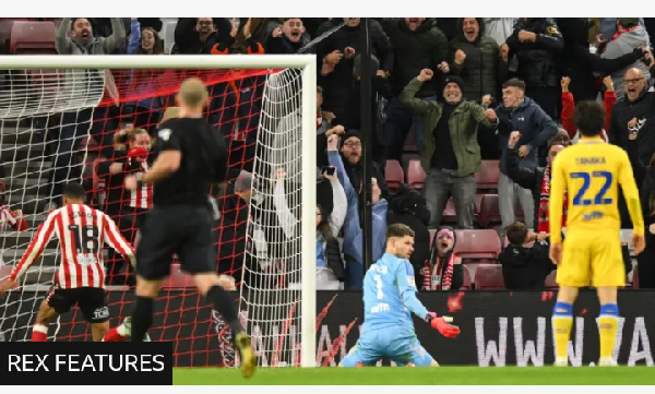 Illan Meslier looks at the ground in disbelief after Sunderland's 97th-minute equaliser