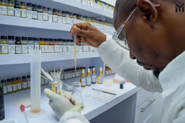 Ghanaian perfumer Yusif Meizongo making what he knows to do best