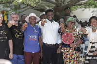 Nana Kwame Bediako, also known as Freedom Jacob Caesar with his wife and partners at the event