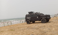 A police van parked at a beach front during the 2021 Easter to help keep off patrons