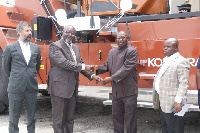 Kwaku Okoh presenting the keys to the reach stackers to Nana-Oduro Owusu