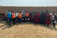 Officials of the company donate the cement to traditional leaders