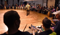 Community members playing African drums