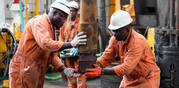 File photo of workers on a oil rig