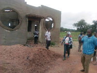 DCE and her entourage inspecting one of the WASH facilities at Pelungu