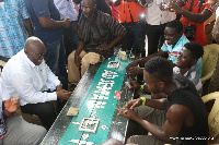 Akufo-Addo (in white on the left side of the bench)