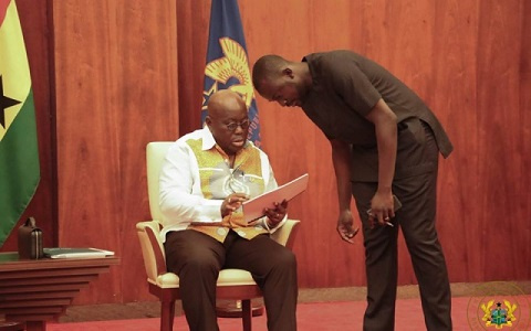 President Akufo-Addo and his Communications Director, Eugene Arhin