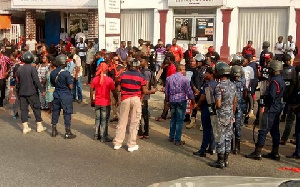 Aggrieved customers of Menzgold embarked on a demonstration Tuesday January 7