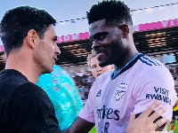 Mikel Arteta (left) and Thomas Partey