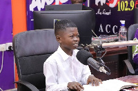 9-year-old Dominic Fobih in the studios of Angel FM on Thursday.