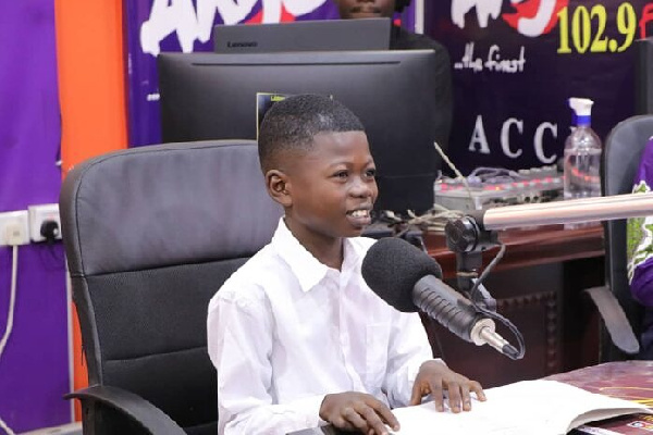 9-year-old Dominic Fobih in the studios of Angel FM on Thursday.