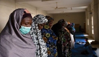 Women pray at a mosque during the holy month of Ramadan