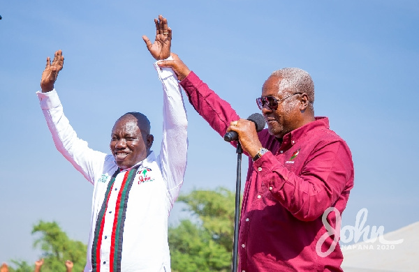 Former president John Dramani Mahama with Isaac Adongo