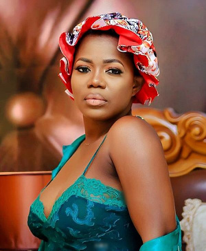 Mzbel wore a red see-through nightie as she showed off her