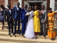 Brother Adu Patrick with his wife and friends and family