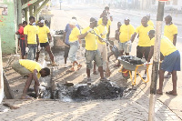 Vivo Energy Ghana Staff and Community Members cleaning their community