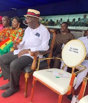 Former president Mahama seat's at the Independence Day right beside former president Kufour's