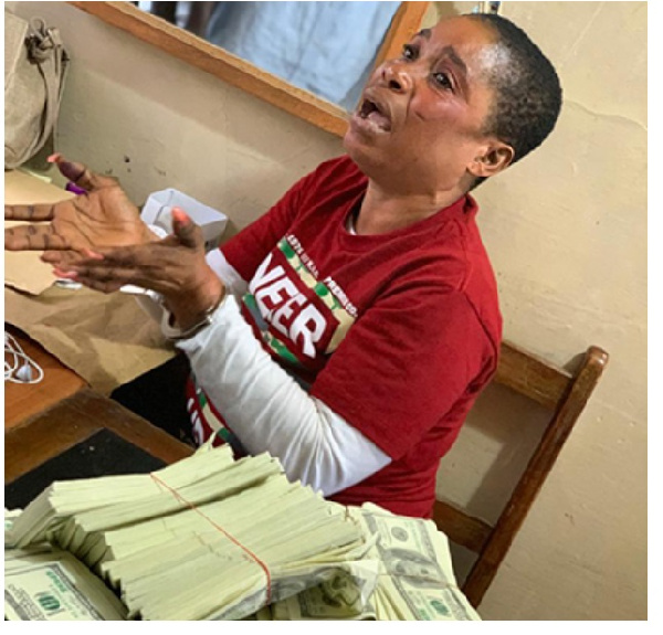 Gifty Osei at the Police Station with the counterfeit currency