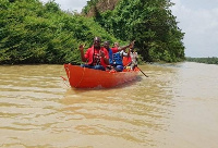 GJA President,Affail Monney on the Black Volta  with some members of the Coalition