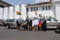 Official of ARAP with officials of CHRAJ in a group photograph after the presentation