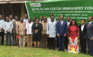 Olam officials in a group photo with COCOBOD CEO, Mr Boahen Aidoo