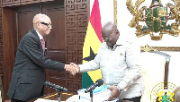 Emile Short presenting his findings to President Nana Addo Dankwa Akufo-Addo